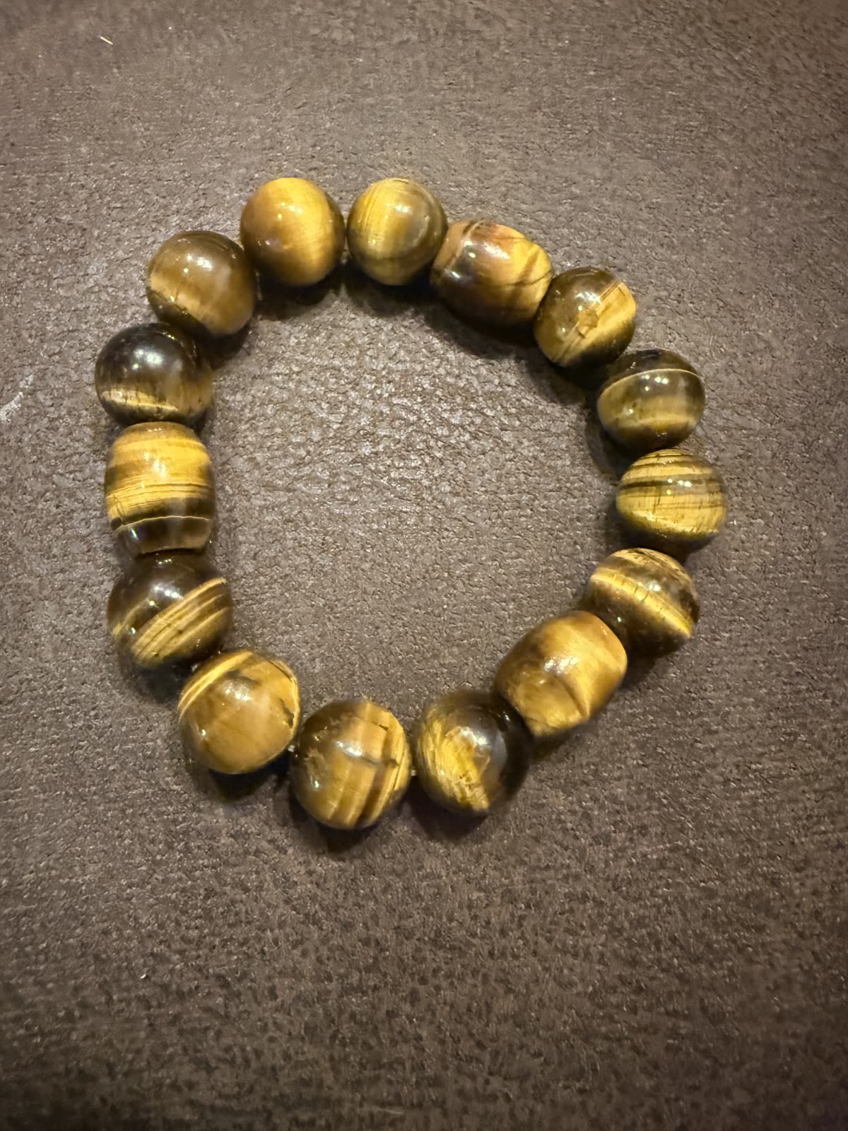 Handmade yellow tiger eye chakra bracelet by Steven Fields